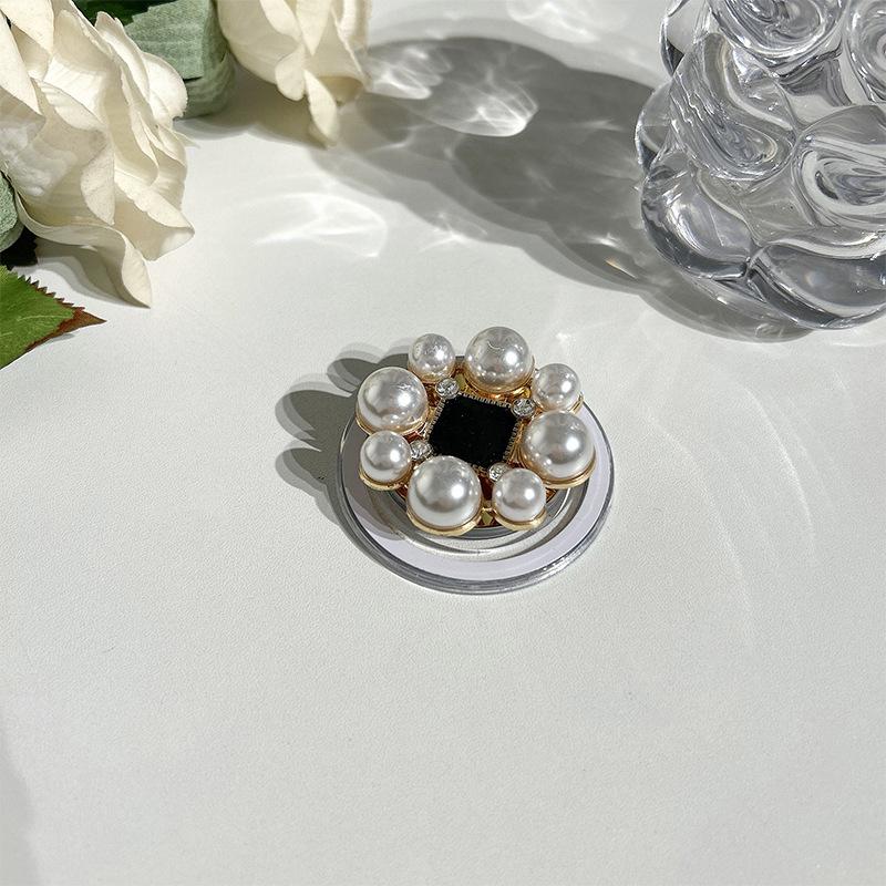 

Rhinestone Gemstone Magnetic Suction Magsafe Retractable Mobile Phone Airbag Bracket Mirror Advanced Sense Light Luxury Watching Dramas Chasing Dramas