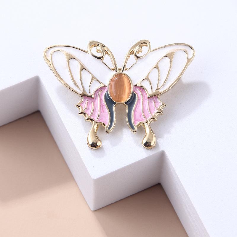 Oliedruppelend Insect Dier Mode Verfijnd Kattenoog Steen Vlinder Anti-reis Broche Speld Vrouwelijke Accessoires Broche Sieraden