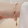 Double Layer Pearl Bracelet: Women's Titanium Steel, 18K Gold-Plated, Colorfast, Fashionable, Light Luxury Design.