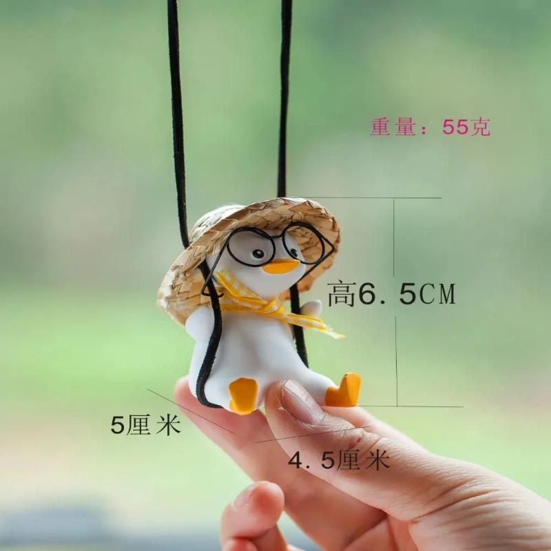 Cute swing duck car pendants, holiday swing duck car interior decoration and glasses rearview mirror pendants, car parts