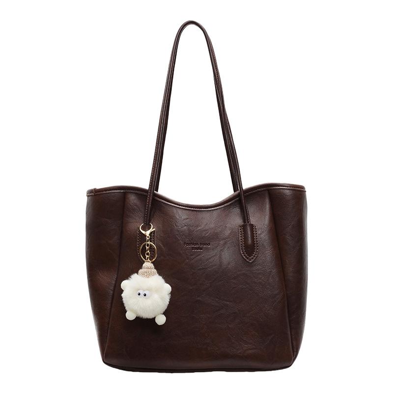 

Casual large-capacity tote bag women s new spring and summer shoulder large bag, high-end student class commuter bag without pendant темно-коричневого