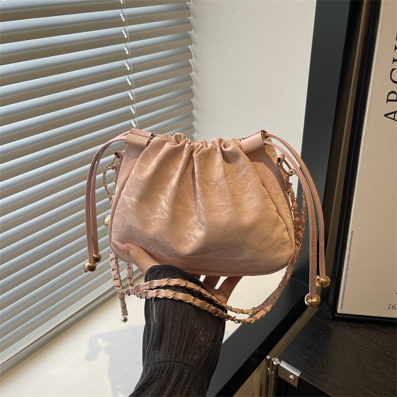 

Девушка поясная сумка повседневная однотонная повседневная литературная и художественная простая цепочка на одно плечо кроссбоди сумка-ведро розовый