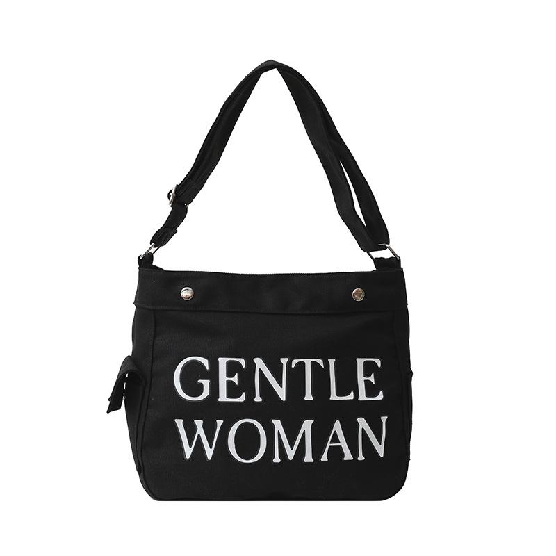 

Буква большая вместимость холщовая сумка 2025 осень и зима нишевая сумка-мессенджер сумка чёрный