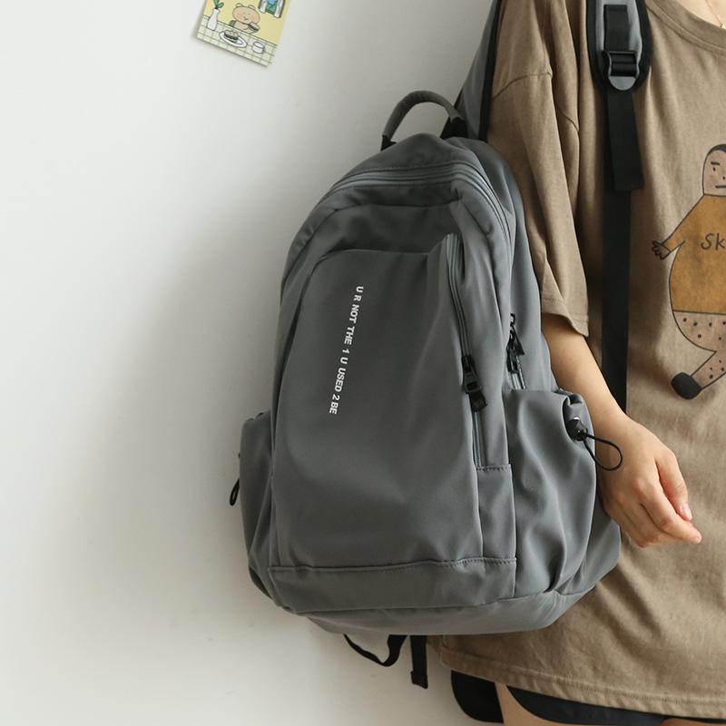 Autumn and Winter New Simple Style Backpack Fashion Letter Printing Travel Backpack Junior High School High School Student College Student Schoolbag