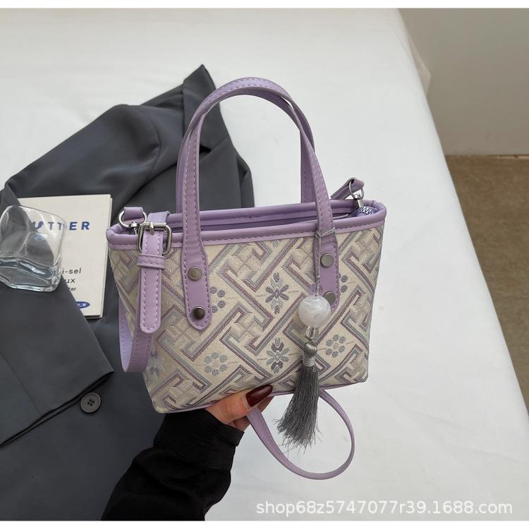 Niche design small bag women's 2025 new foreign style fashion portable bucket cloth bag women's commuter shoulder messenger bag