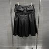 2025 A/W Black Pleated Leather Skirt with Detachable Velcro Pockets & Patchwork A-line Design