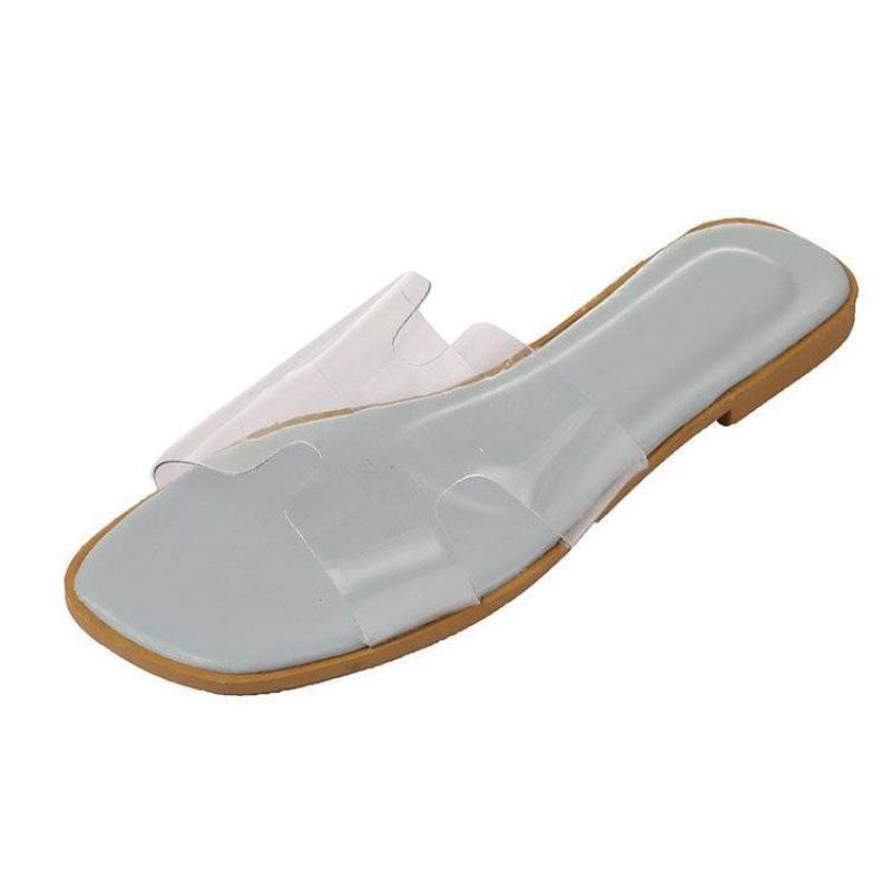 Summer new women's shoes one word fashion Korean version transparent jelly cool slippers flat bottom women's square head slippers women