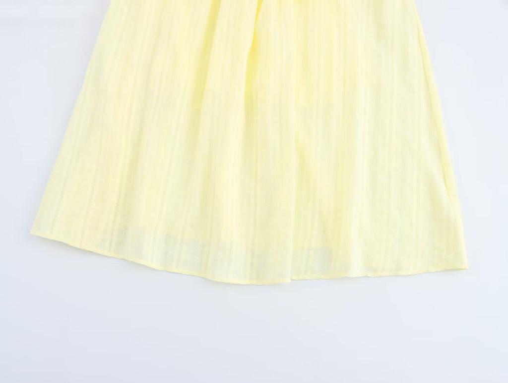 Rochie lungă texturată de primăvară 2025 pentru femei, stil european și american, cu bretele spaghete și fundă la piept.