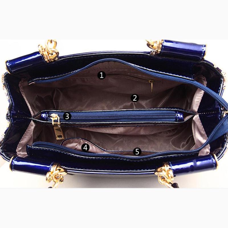 Borsa da Donna in Pelle di Lusso con Finiture a Fiore Lucide