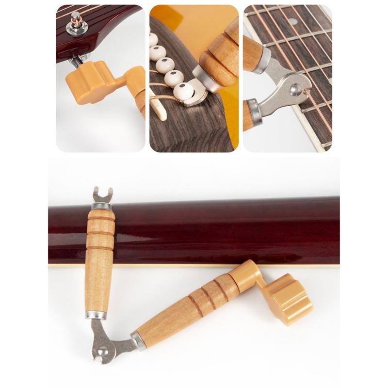 Strumento portatile per il cambio corde con avvolgicorda di precisione e impugnatura ergonomica, presente per gli appassionati di manutenzione della chitarra
