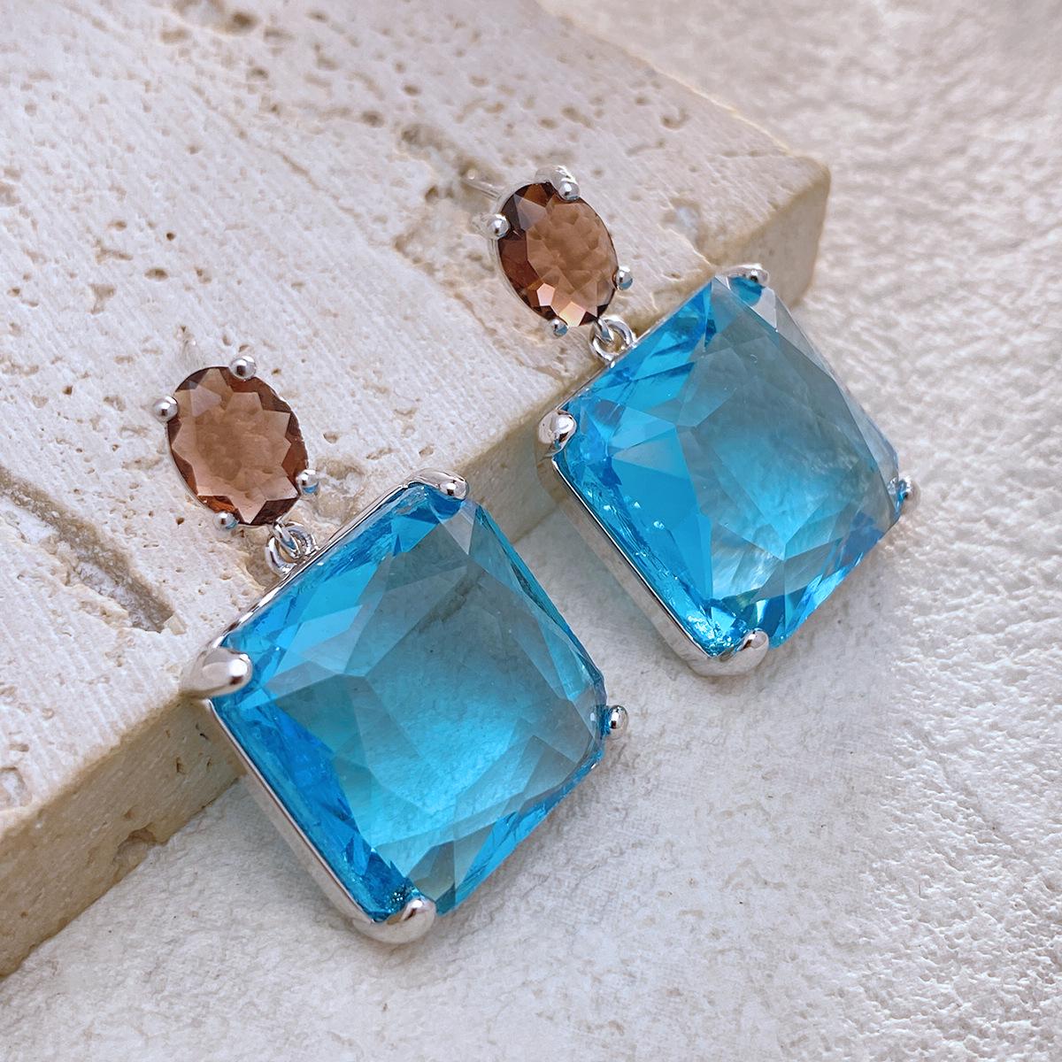 

Vintage European & American Emerald Zircon Earrings: Copper-Plated with Real Gold 18K