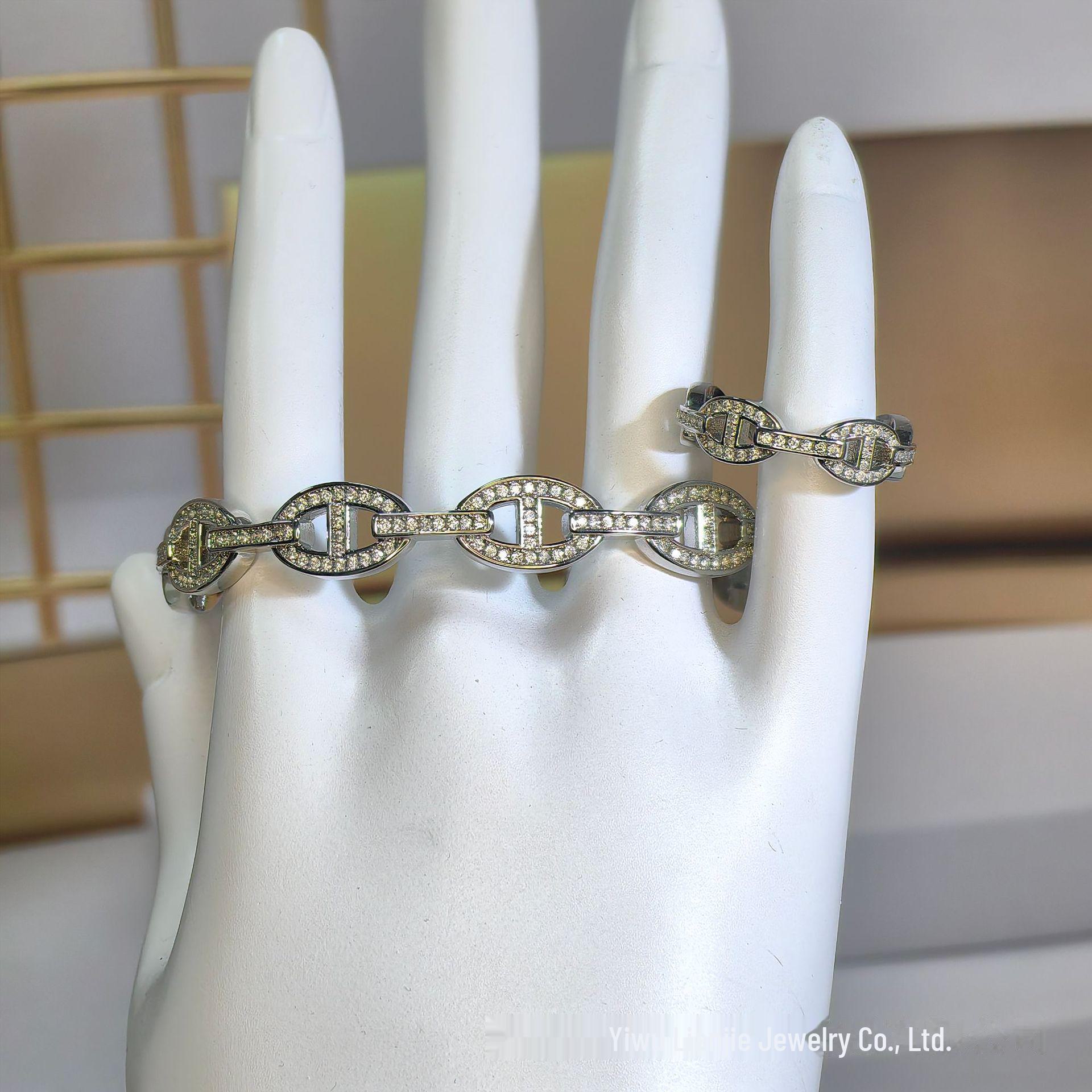 

Европейская и американская мода циркониевый свиной нос позолоченный открытый браслет и кольцо комплект: Изысканный, роскошный и модный