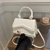 Spring 2025 new fashionable and simple popular simple shoulder portable oblique span women's bag foreign style solid color small square bag