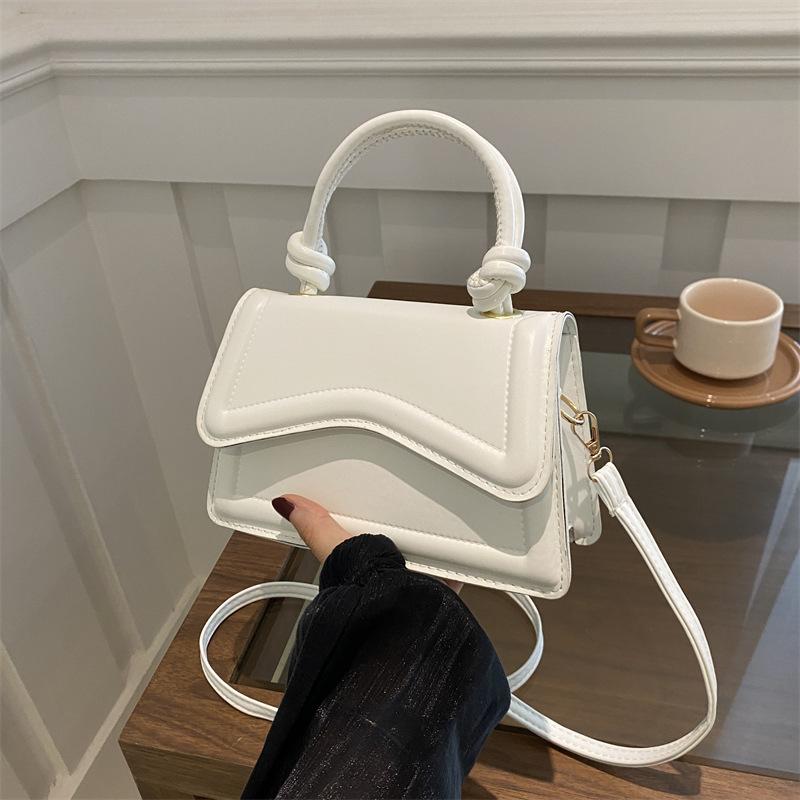 Spring 2025 new fashionable and simple popular simple shoulder portable oblique span women's bag foreign style solid color small square bag