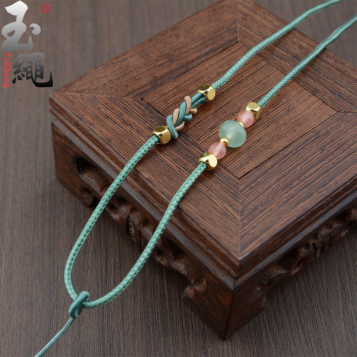 Adjustable Gold Jade Pendant Necklace with Hand-Woven Cord for Men and Women, Featuring Amber Accents.