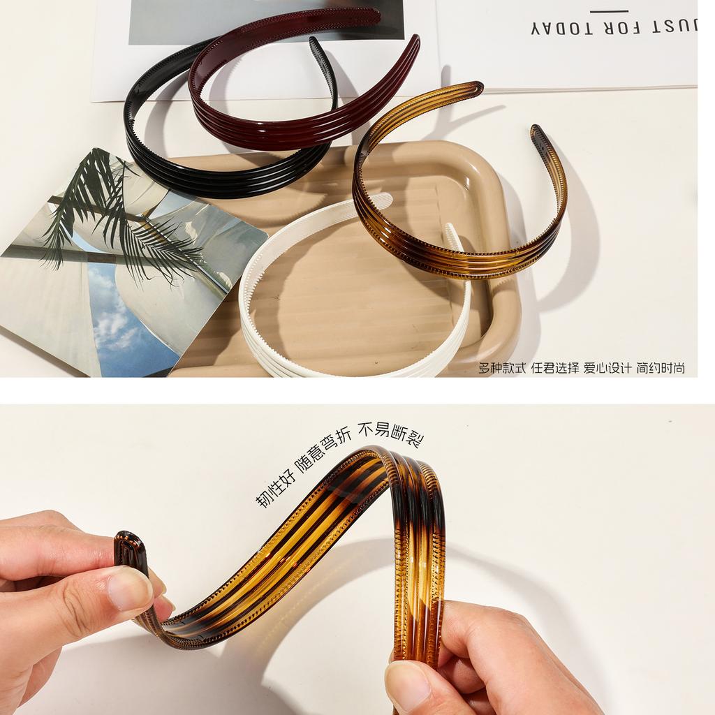 Korean retro striped glossy headband fashionable amber toothed non-slip headband PC advanced sense cranial top hairpin woman