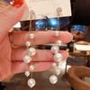 Korean Dongdaemun Long Pearl Fashion Earrings: Elegant Dangle with Versatile Silver Studs