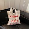 2025 spring and summer new mesh shoulder bag fairy wind lotus leaf edge handbag female vacation sewn chiffon tote bag