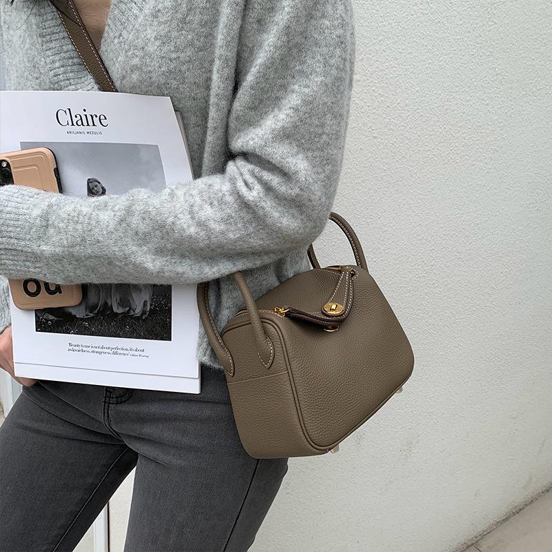 2025 New Style Womens Bag Real Leather Single Handle Tote Bag Top Handle Bag All-Match Lindy Bag Doctors Bag Mini
