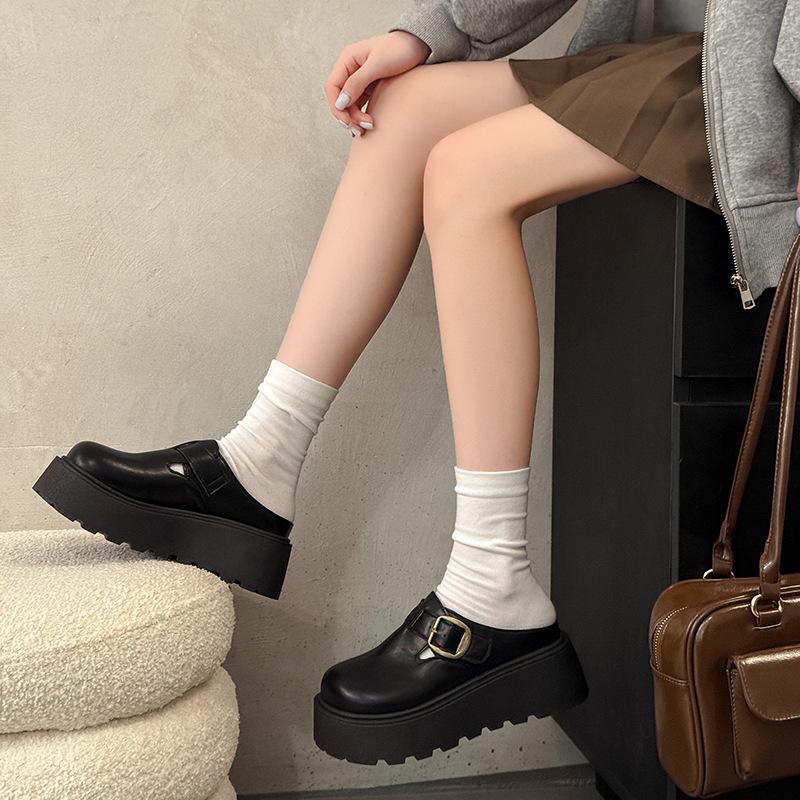 Thick-soled bag head half slippers for women to wear in the autumn of 2025, new models, leather surface, round head height increase, small leat