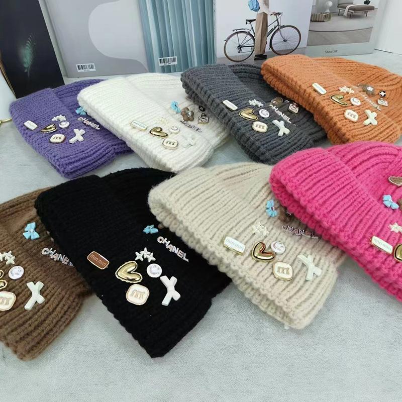 Korean version designer knitted hat children's sweet button face small wool hat autumn and winter bag head warm cold hat