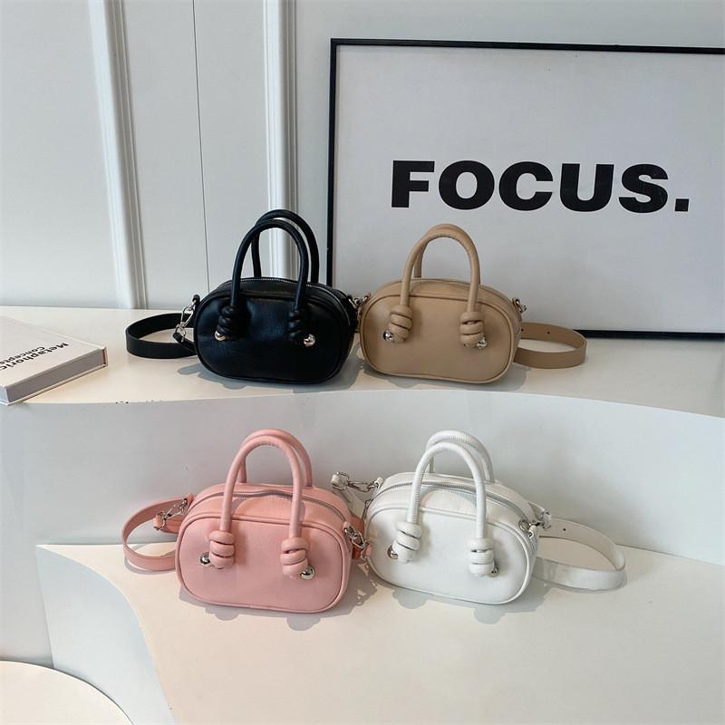 High-end Shell-shaped 2024 New Small Pu Leather Handbag With Urban Minimalist Style