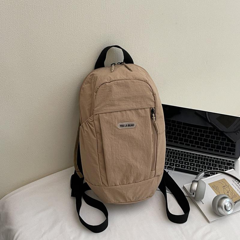Schoolbag Man Walking Small Backpack Student Travel Bag Light Outdoor Small Backpack.