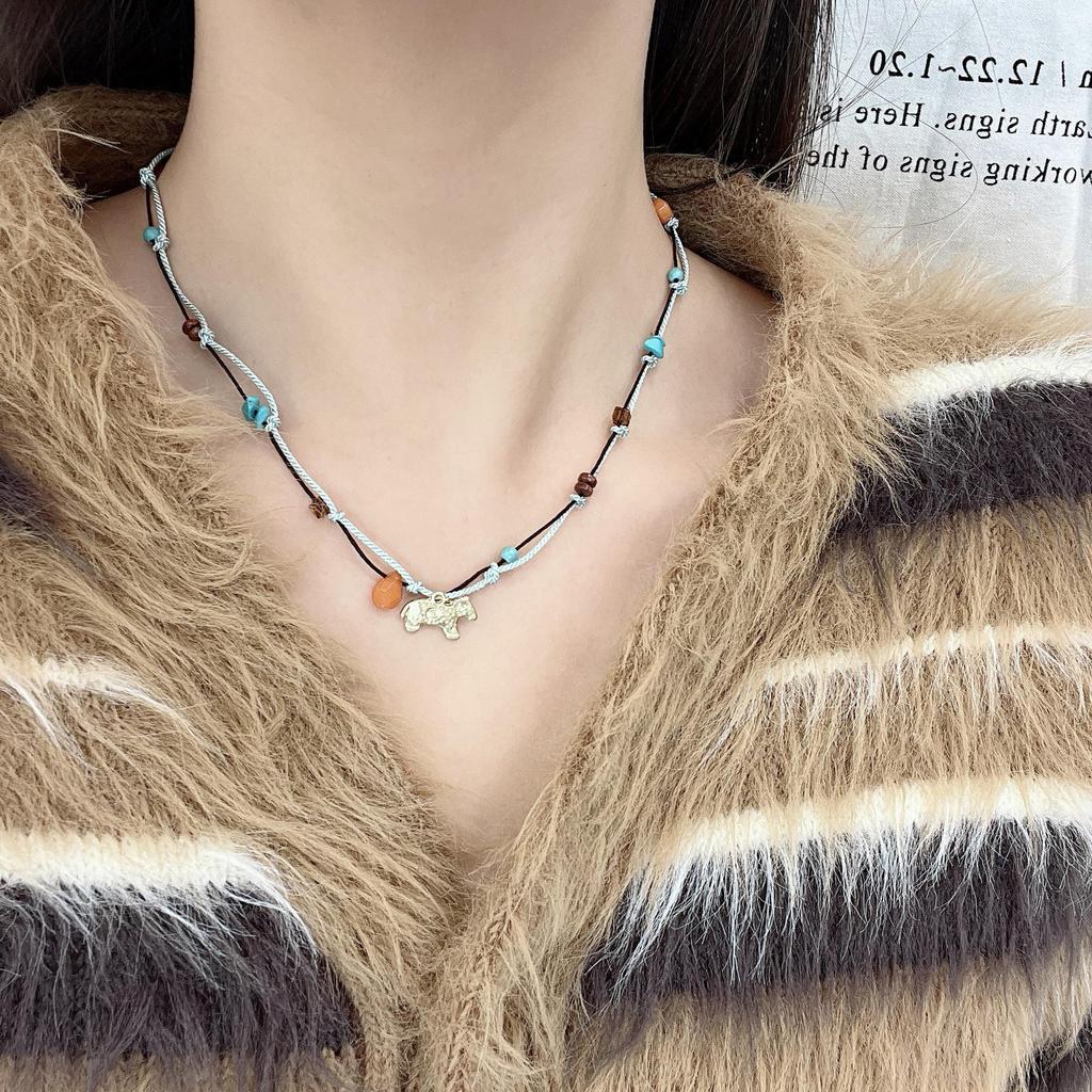 Elegant Hand-Woven Beaded Elephant Necklace - Exquisite Retro Chinese Design for Women