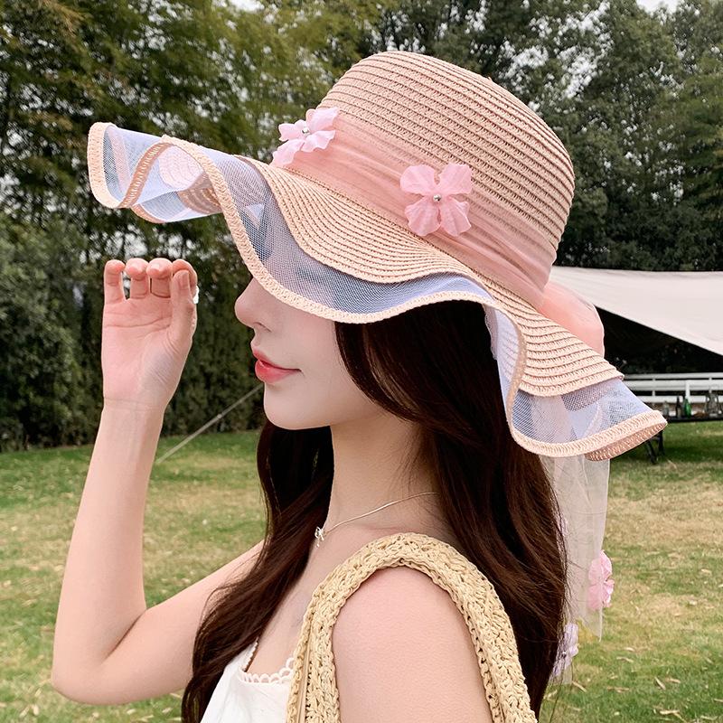 Straw hat women's summer seaside big brim sun hat new outdoor travel leisure wave three-dimensional flower streamer sun hat
