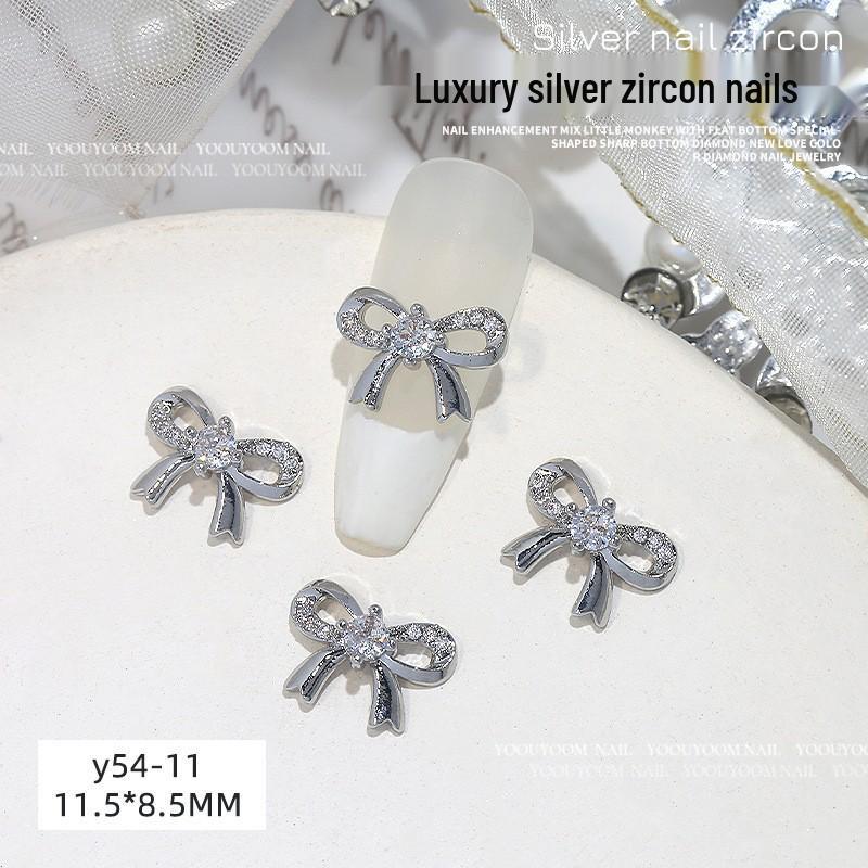 

Silver Zircon Starburst Bow Nail Art Pendant - Wearable Diamond Nail Decoration