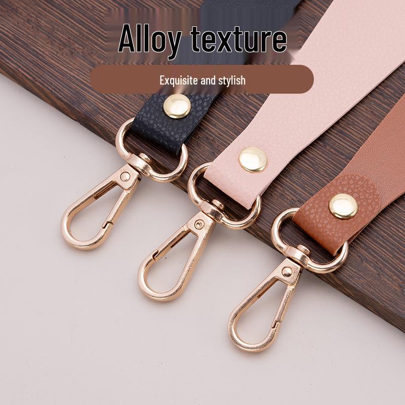 PU Leather Hat Clip: Portable, Hands-Free Holder for Sun and Baseball Caps - Anti-Loss Buckle Design.