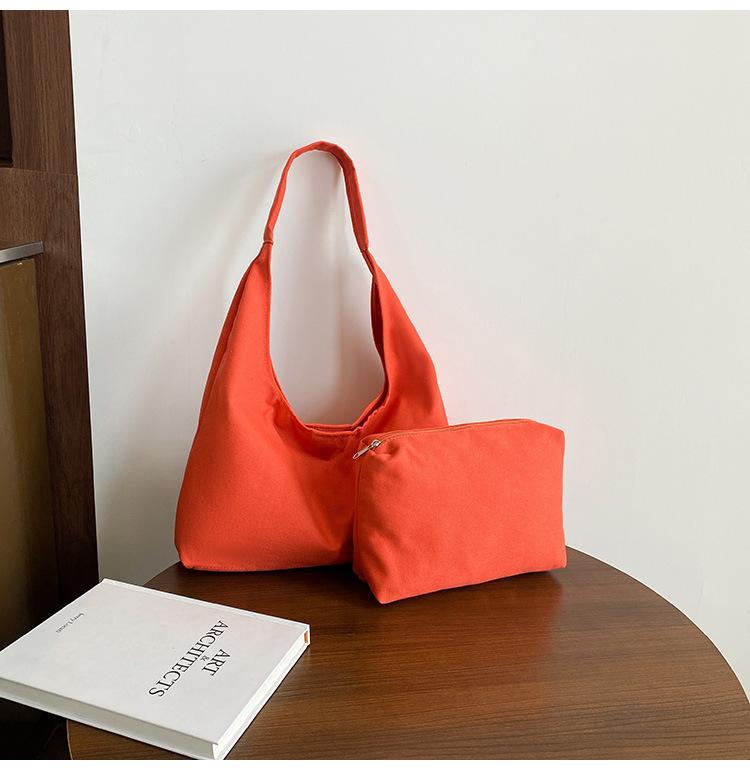 

Japanese simple canvas large-capacity shoulder women s bag portable tote bag shopping bag solid color lightweight retro handbag оранжевый