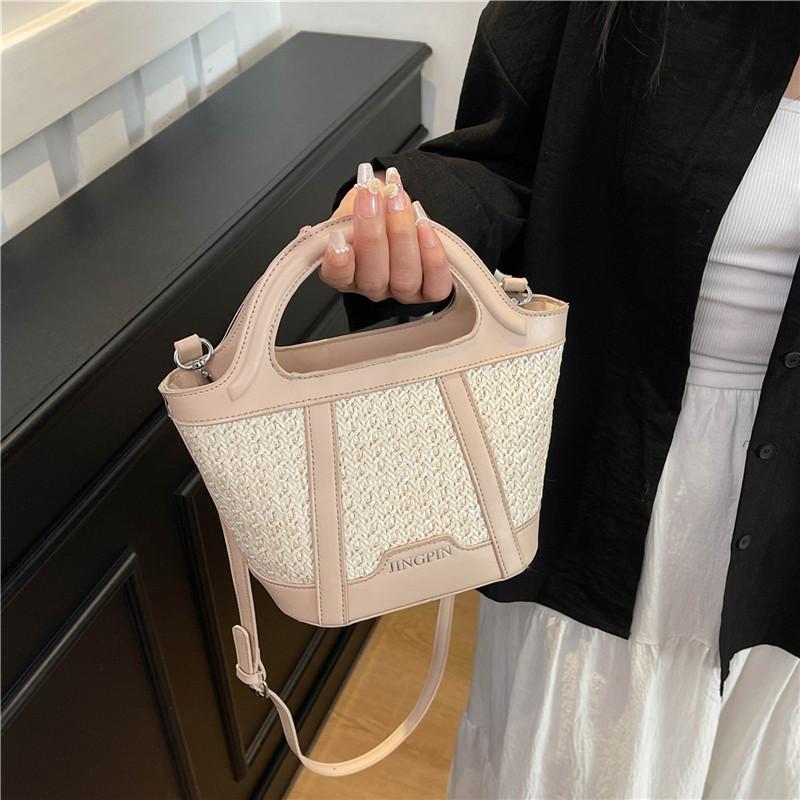 Casual fashion portable bucket bag women's summer new straw shoulder bag texture splicing messenger bag