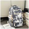 The new schoolbag is high-value, fresh and sweet, literary tie-dye backpack, couple contrasting colors, light travel backpack.