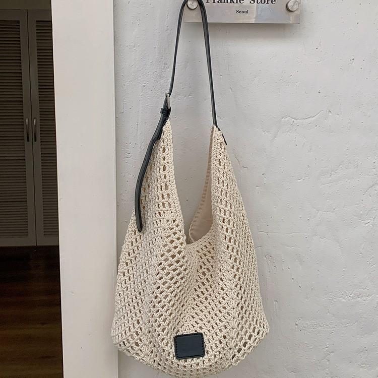 Woven hollow bag women's new seaside vacation style travel tote bag beach bag shoulder armpit bag tide