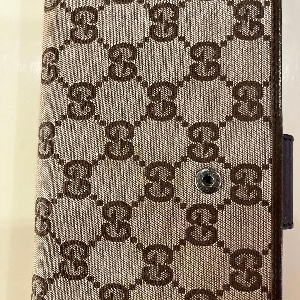 Used Beautiful condition, popular classic GUCCI GG canvas bi-fold long wallet