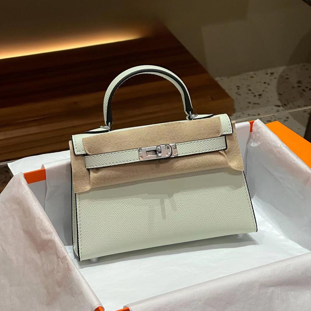 Grenzüberschreitende Hersteller Großhandel Damenhandtaschen 2023 neue Handtaschen aus Leder mit Palmenmuster tragbare Schulter-Umhängetaschen Damenhandtaschen große Kapazität