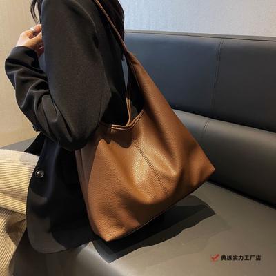Versão coreana de alta qualidade, com senso de luxo, grande capacidade, casual, couro macio, cor sólida, para o trabalho, ombro, bolsa tote estilo retrô francês