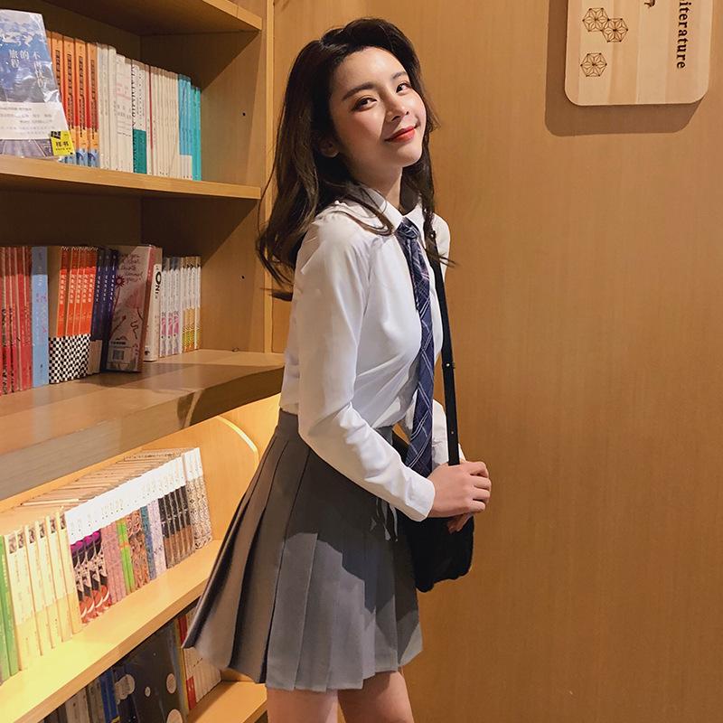 pleated skirt women's college fresh temperament high waist thin versatile Korean version slim skirt spring and autumn fashion a word solid color