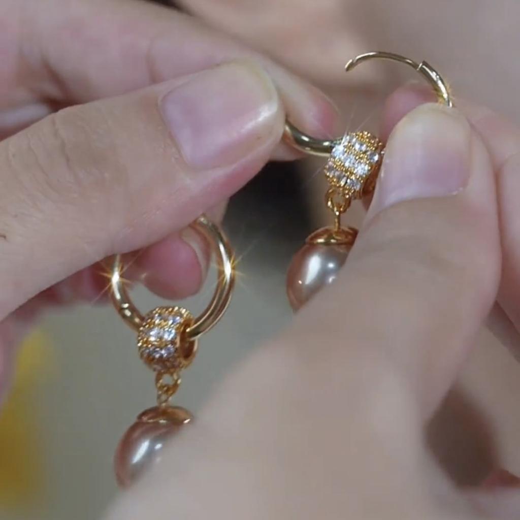 Champagne pearl fringed ear buckle, light luxury temperament, high sense of face, thin earrings, versatile Internet celebrity earrings