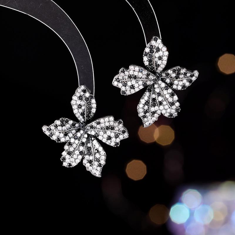 

Новый женский дизайн серьги Лилия Лист Легкая Роскошь Модная Бижутерия Аксессуары Повседневные Аксессуары