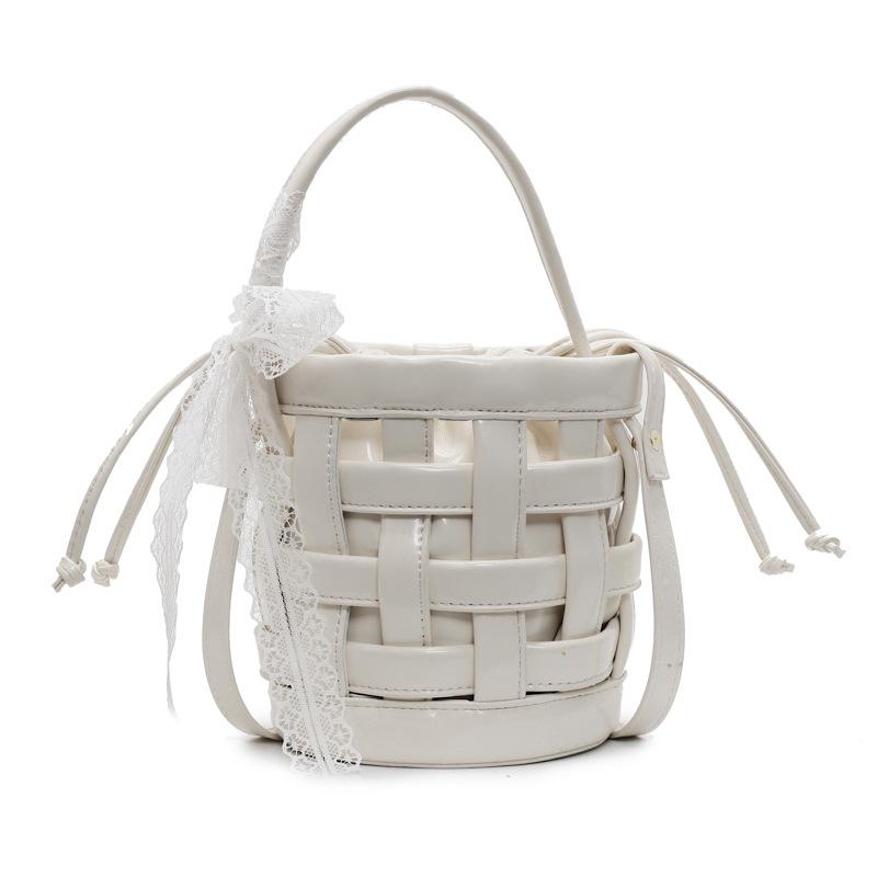 This year's popular bag 2025 new Korean version fashion hollow woven bag women's portable crossbody drawstring bucket bag