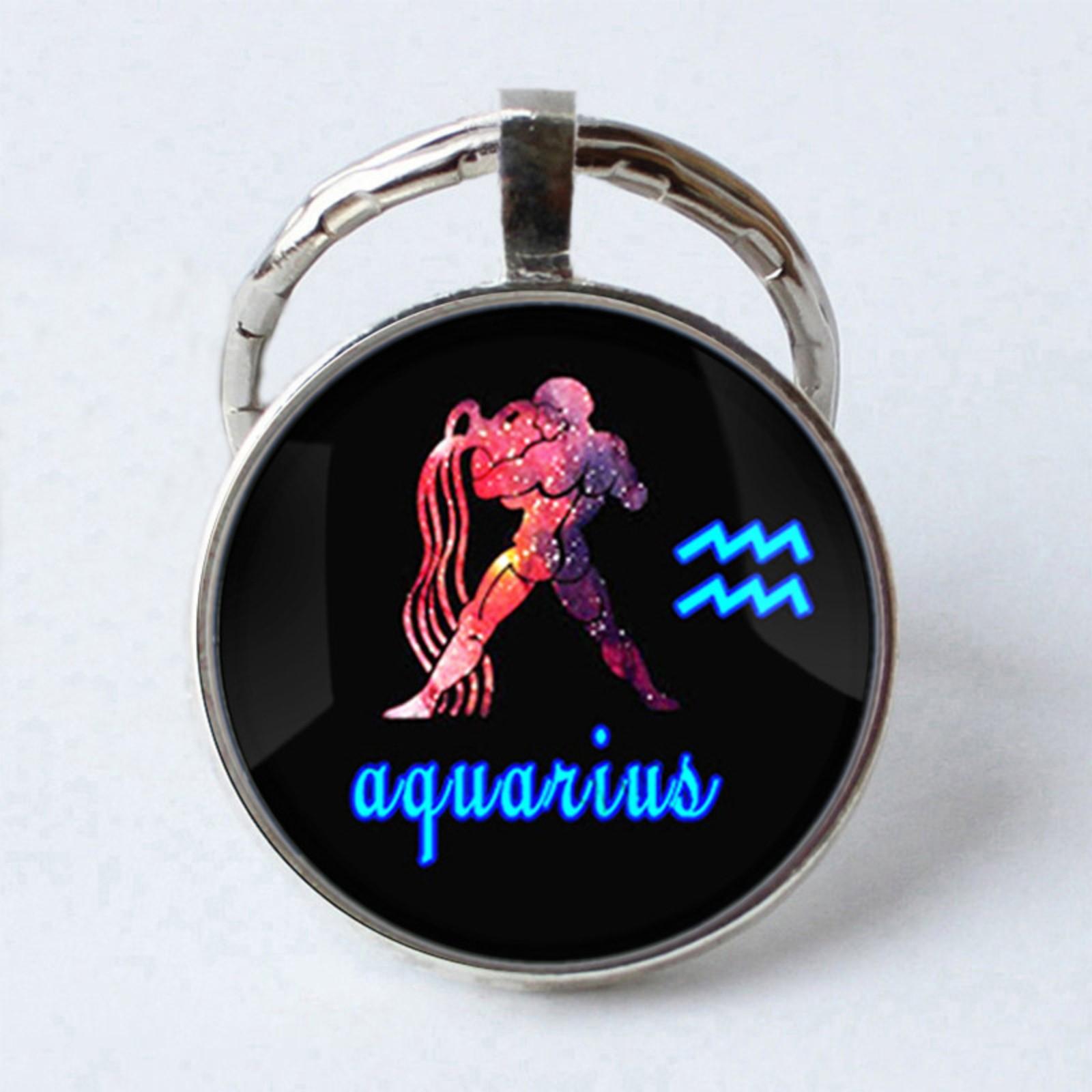 

Металлический брелок с драгоценными камнями и символами зодиака One Size