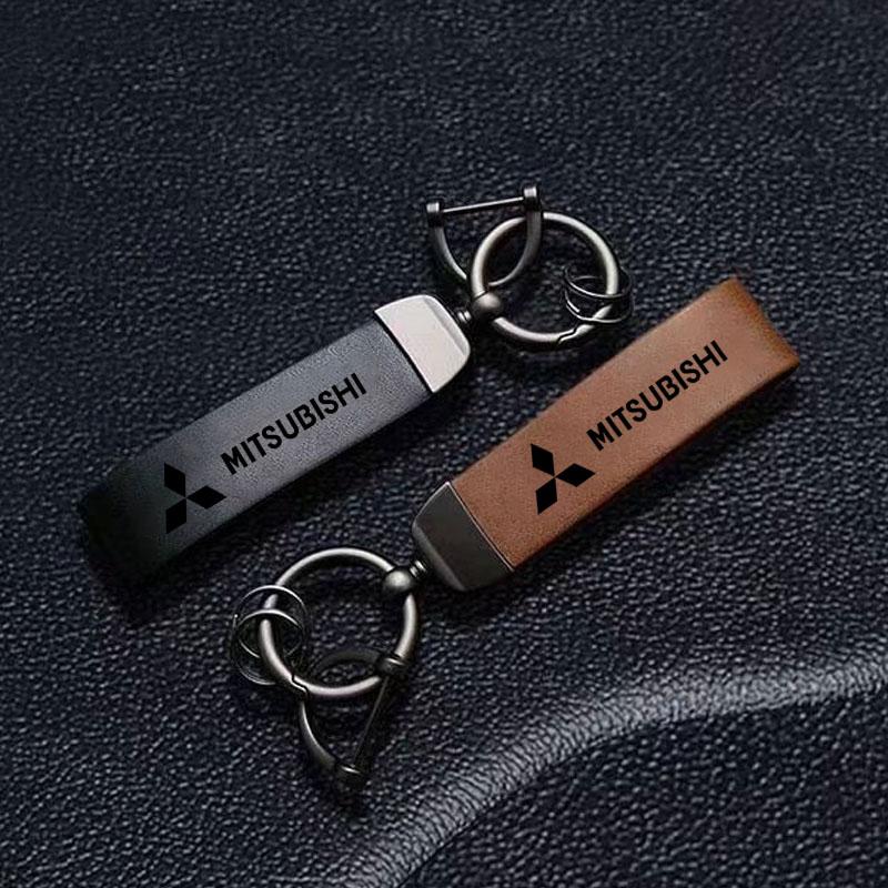 Autoschlüsselanhänger Luxus Echter Leder Schlüsselanhänger für Mitsubishi Pajero Sport Eclipse Cross L200 Colt Delica Ralliart Triton Auto