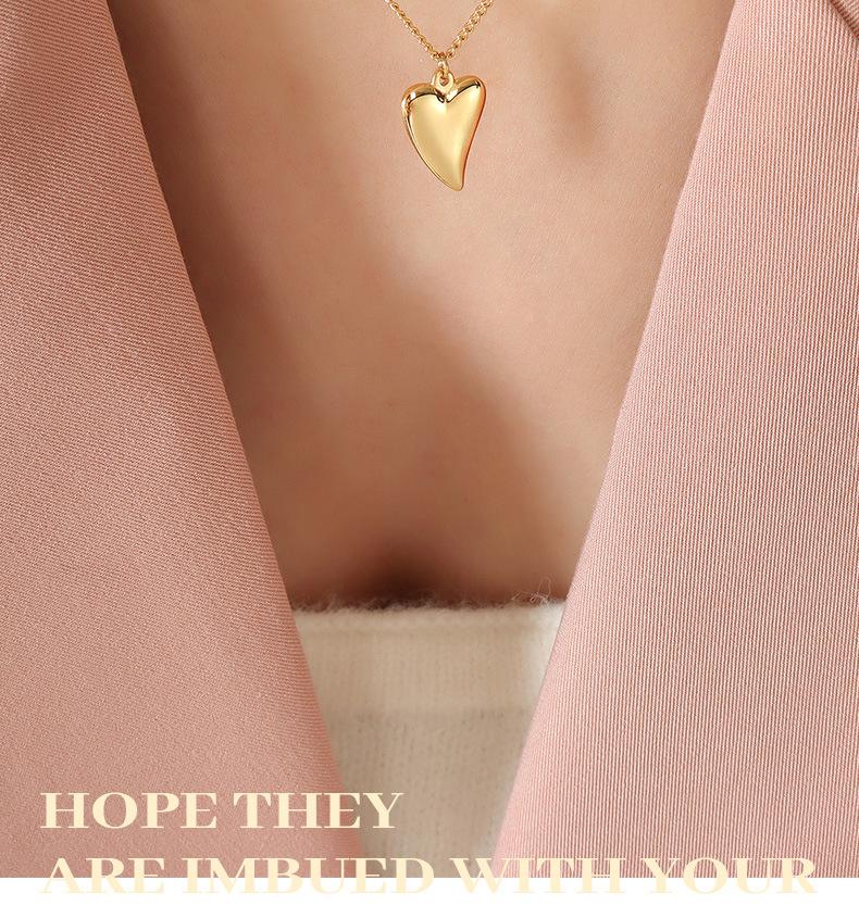 Stylish Heart Pendant Necklace: 18K Gold-Plated Titanium Steel, Cold-Style Clavicle Chain for Women
