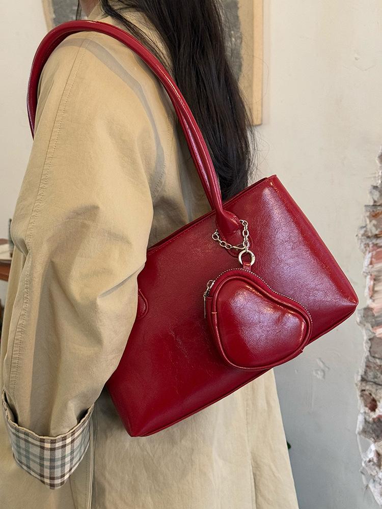 

Корейская нишевая высококлассная сумка через плечо с длинной ручкой, новая сумка для наушников love большой вместимости, сумка-тоут для поездок на работу.