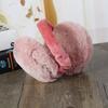 Women who sell fur, winter warm earmuffs the earmuffs on their ears the warmer the headband earmuffs