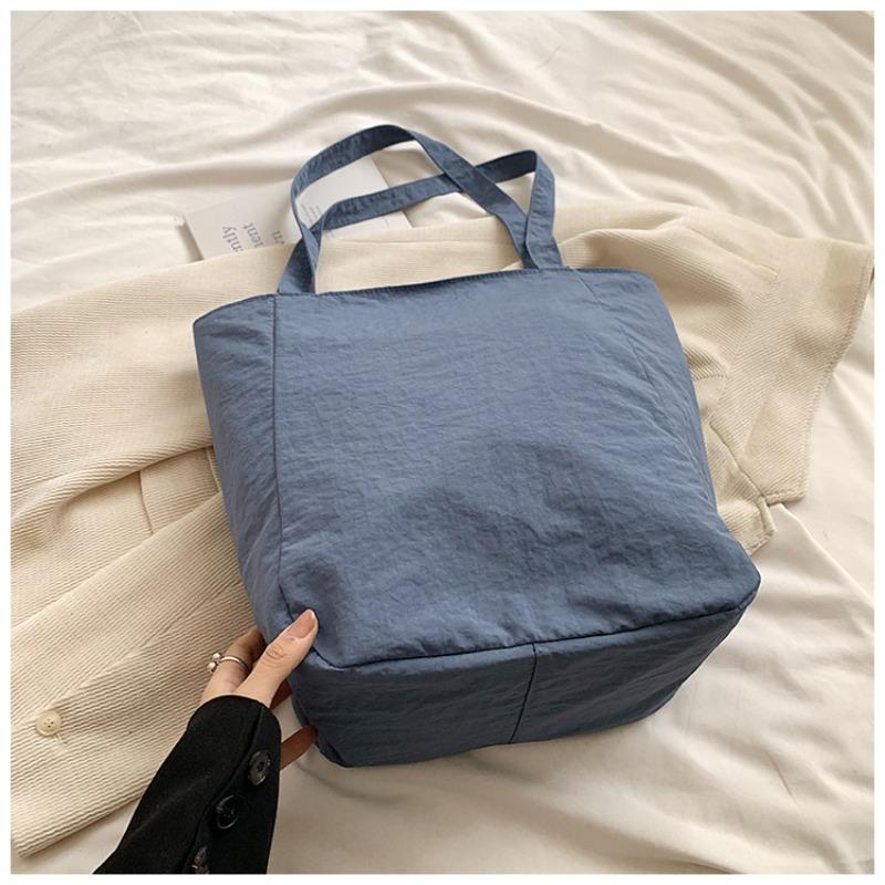 

Casual retro commuter tote bag women s large capacity summer new simple fashion shoulder bag fashion bag синій