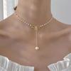 Elegant Pearl Bowknot Tassel Pendant Necklace: High-End Autumn Winter Women's Fashion