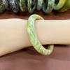 Xiuyu Jade Bangle with Earth Blue, Red, Lemon Yellow, Dark Blue, and Dark Green Veins